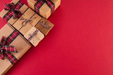 Fototapeta na wymiar Boxing Day Concept. Different kinds of gift boxes on red background
