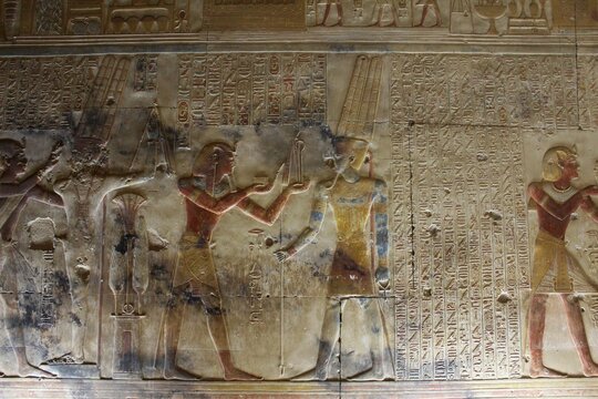 Inscriptions on the walls and columns of seti 1 temple in Abydos in Sohag in Egypt