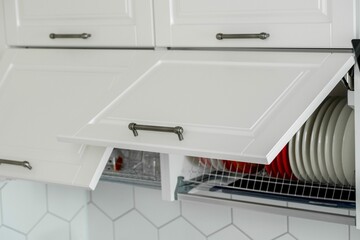 Kitchen hanging shelves with doors for storing and drying plates