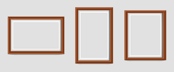 Set of three frames photo picture frames on wall, vector white mockups or empty posters. Empty photo frames mockups for pictures or photograph, realistic 3D blank templates