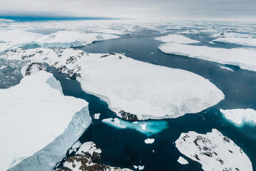 Icebergs floating in the ocean, global warming concept, aerial view © Robert Kiyosaki
