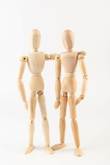 Wooden people hugging. People relationship concept. Friends.