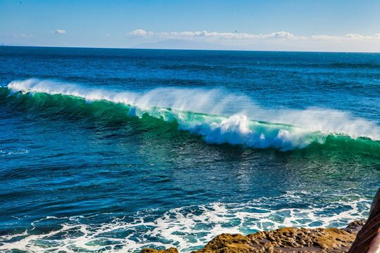 Santa Cruz, United States - January 27 , 2013 : Surf capitol of the US. Only the bravest surfest dare to ride these waves.