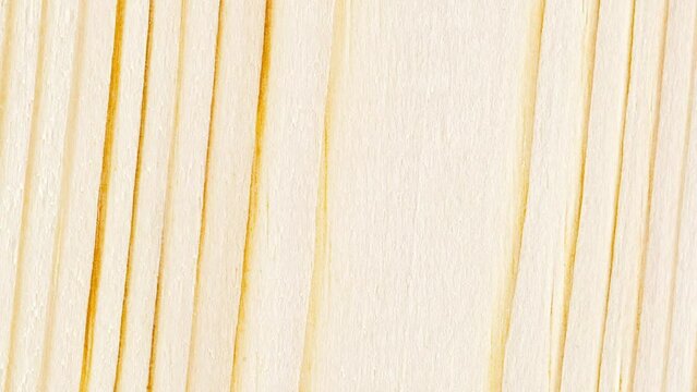 Wooden surface, structure lines, processed, with horizontal parallel stripes are dark, background, rotating, turning, close-up macro, top view