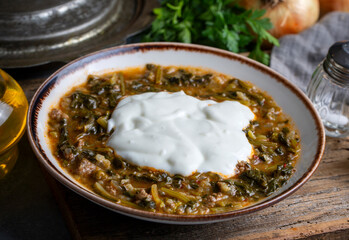 Traditional Turkish cuisine purslane dish with yoghurt (Turkish name; Yogurtlu semizotu yemegi)