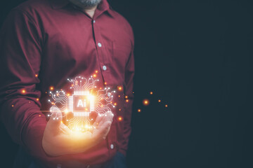 Businessman holding on AI circuit board virtual screen with network internet online. Technology Artificial intelligence, AI circuit board in shape electronic. Innovative technology concept.