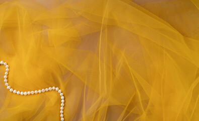 Yellow tulle fabric texture top view