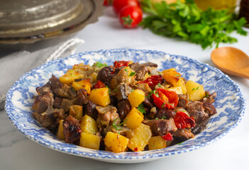 From Turkish cuisine; meat, vegetable kebab, casserole. Turkish name; Maras Tava or Kahramanmaras Tava - Orman Kebabi