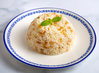 Traditional delicious Turkish food; Turkish style rice pilaf (Turkish name; Arpa sehriyeli pirinc pilavi)