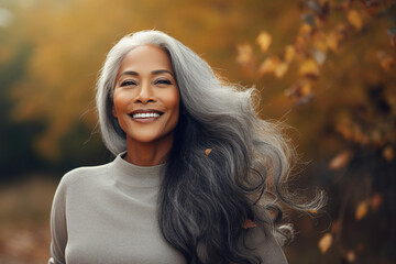 Generative AI technology picture of gorgeous grey haired woman walking autumn park
