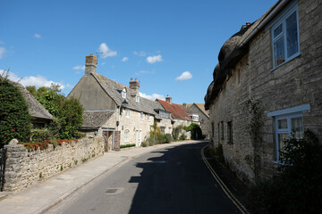 Fototapeta na wymiar Quaint village street Corfe Castle, Dorset