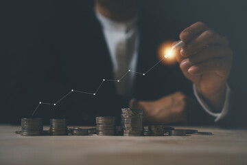 businessman planing and using holographic in the office workplace for work progress about...