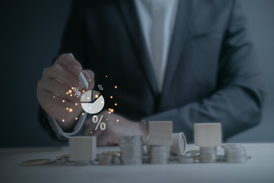 person planning the business plans and analyse  profitability of working companies with digital augmented reality graphics for project manager working on laptop and updating business plan