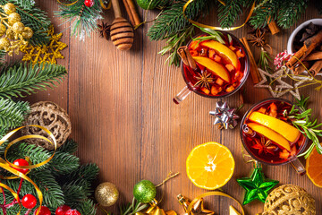 Traditional Christmas aromatic mulled wine cocktail, red wine grog tea drink with spices, cinnamon,...