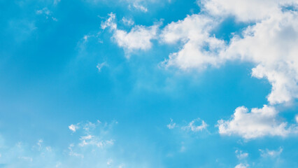 Blue sky with white fluffy cloud. Cumulus clouds background. Cloudscape morning sky. The concepts of freedom of live, never give up and positive though energy.	
