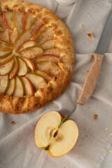 Fruit pie with apples. Galette with apple and tea. Homemade baked goods for the holiday. 