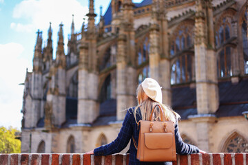 Traveler exploring old St. Barbara's Cathedral in Kutna Hora