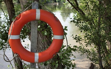  Lifebuoy on the bank of a fishpond