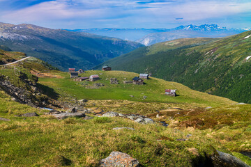 Naklejka premium Seter mountain farm landscape along Aurlandsfjellet scenic route near Kvignadal, Norway.