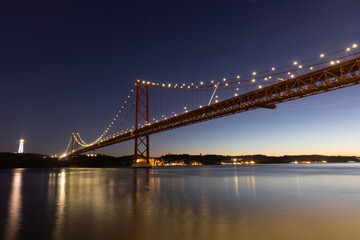 Fototapeta na wymiar 25 april bridge in Lisbon, Portugal at dusk