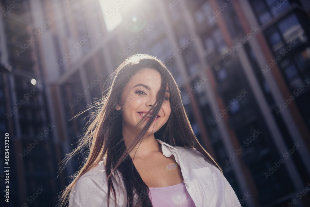 Sticker Portrait of lovely positive girl beaming smile have good mood enjoy sunny warm weather city center outside