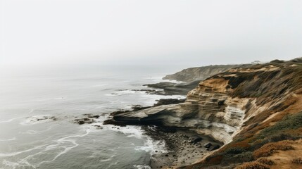 Fototapeta na wymiar Rocky cliff side view and ocean