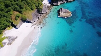 Fototapeta premium View from above of sandy beach with blue sea