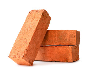 Cracked old red or orange bricks in stack isolated on white background with clipping path and shadow in png file format