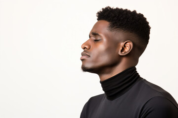 Obraz premium a man with a black shirt and a black turtle neck