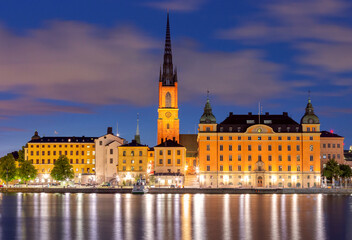 Fototapeta na wymiar View of the city courthouse and the bell tower of Riddarholmen Church in Stockholm.
