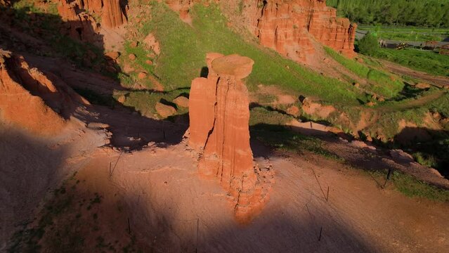 erzurum narman fairy chimneys green grass on red soil aerial view 4K