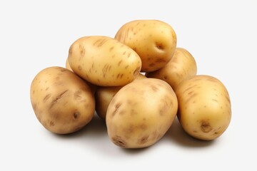 A pile of potatoes sitting on top of each other. Versatile image that can be used for various cooking and food-related themes