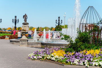 Beautiful Garibaldi Castle with a flower garden. Togliatti, Russia - 29 Aug 2023
