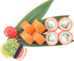 Portion of salmon rolls with avocado on bamboo leaf
