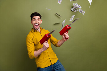 Photo of cheerful overjoyed guy wearing stylish clothes shooting dollars wealth luxury luck success...