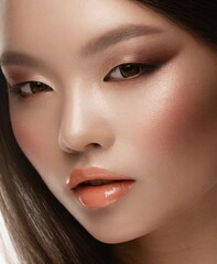 Beautiful Asian female model beauty makeup, face closeup