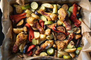 Grilled vegetables and chicken on parchment