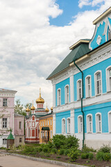 Fototapeta na wymiar Church buildings in an Orthodox monastery in summer.