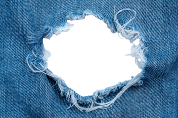 Hole in denim on a white background. Ripped jeans