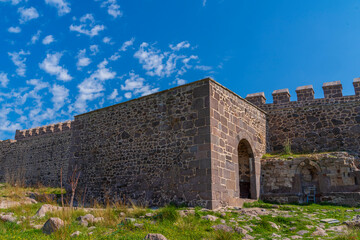 Fototapeta na wymiar Canakkale Babakale walls made of stone around the walls