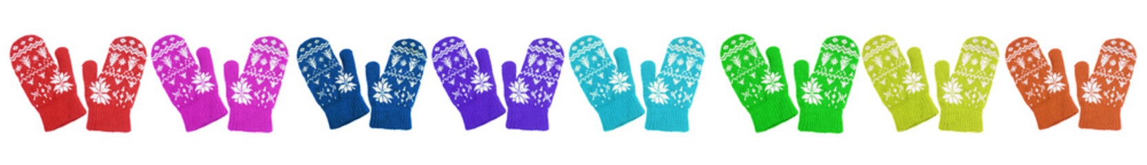 Set of colorful snowflakes wool mittens. Christmas winter gloves isolated on white background.