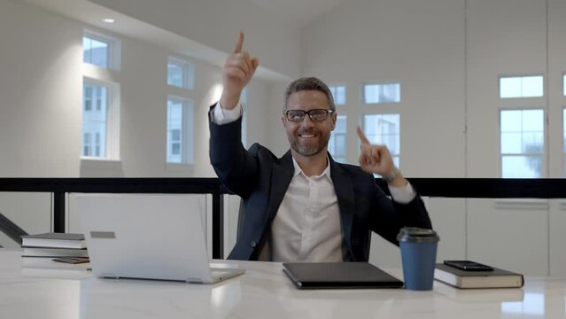 Excited businessman in office. Business goal, excited office worker have excited idea. Success business. Job proposal, business offer. Executive businessman cheering excited. Good business news.