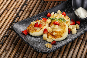 Russian cuisine curd pancake Syrniki