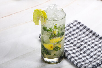 Mojito cocktail with lime and rum