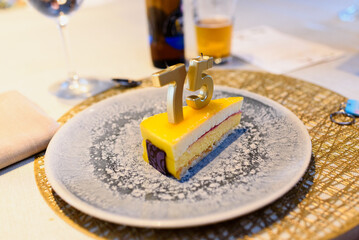 A 75th birthday cake, already served on a plate.