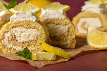 Lemon roll with fruit curd, with mint, close-up