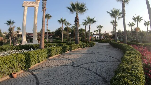 a journey through the garden of a hotel complex in Turkey