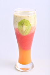 Mango strawberry and kiwi layered juice 