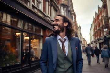 Fototapeta premium A man with long hair wearing a suit and tie
