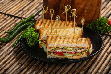 Club sandwich with chicken cheese and salad